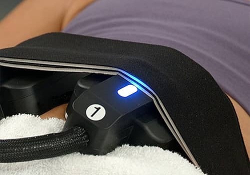 Physiq device being used on womans stomach